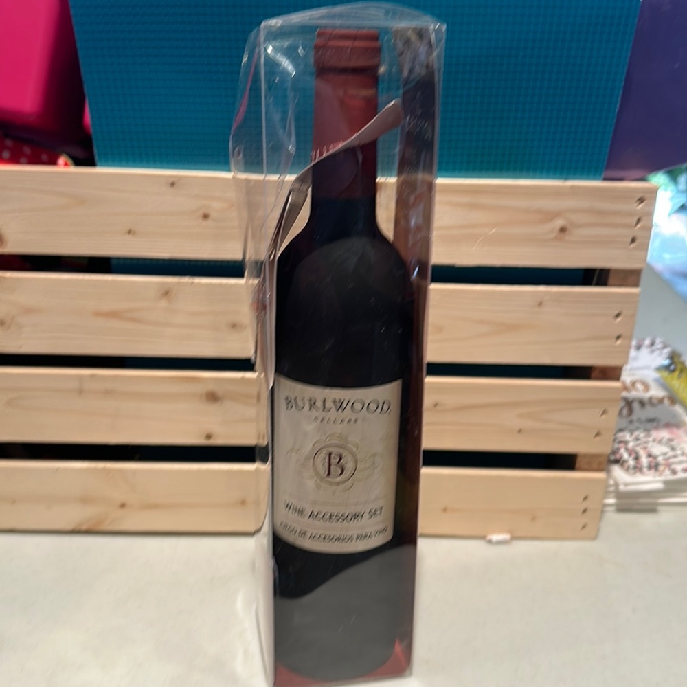 Wine Accessory Kit NEW. All tucked in wine bottle. Just opened to take picture